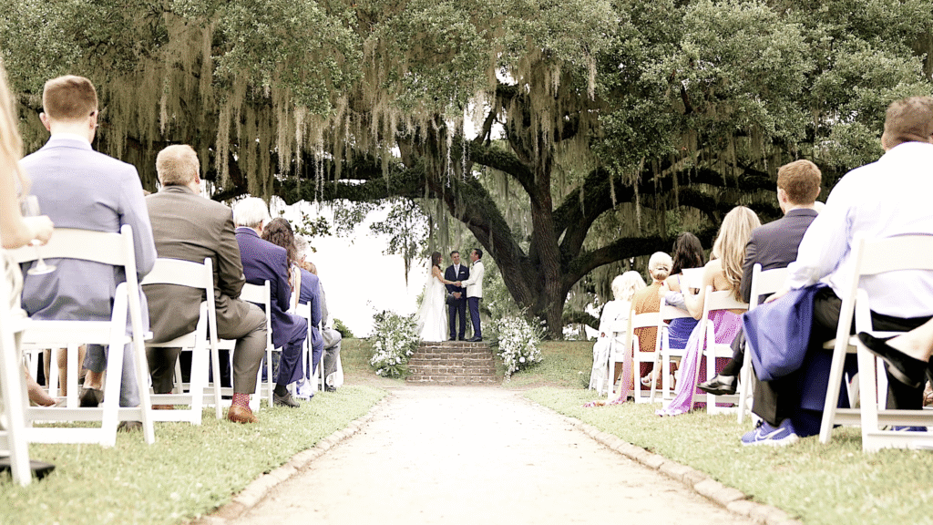 Bride and Groom have their wedding ceremony under the live oak at Middleton Place.