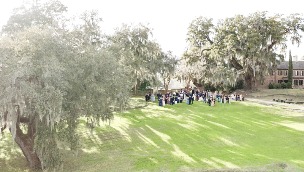 Guests enjoy cocktail hour behind the House Museum at Middleton Place,