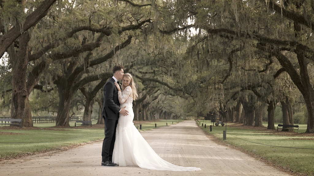Couple photos in the Avenue of Oaks at Boone Hall