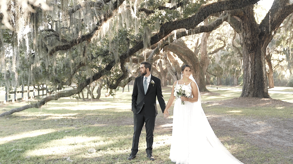 Couple photos by the horse stables at Boone Hall