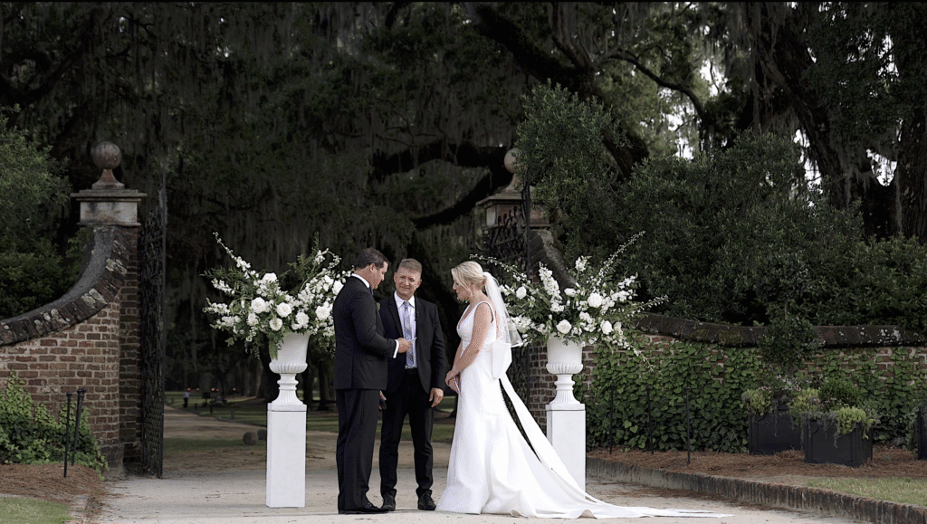 Ceremony in the front lawn path at Boone Hall