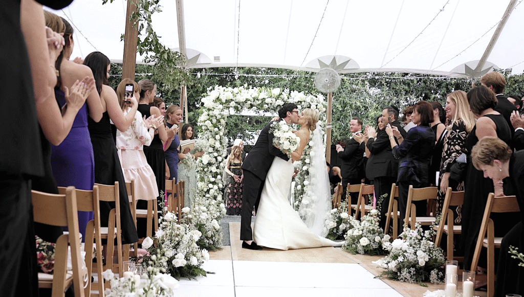 Post ceremony kiss in the Lendhart Garden at the Gibbes Museum of Art